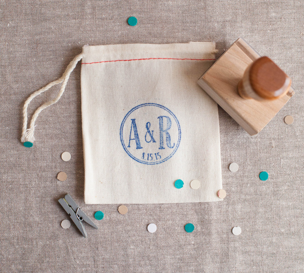 DIY Tutorial! Learn how to stamp a cotton favor bag! With a few simple supplies you can create a personalized favor bag!
